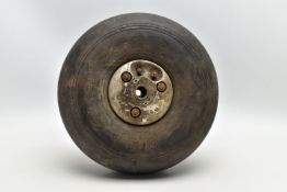 A WWII AIRCRAFT PNEUMATIC WHEEL, PROBABLY FROM A HAURRICANE OR SPITFIRE, the black rubber marked '