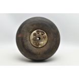 A WWII AIRCRAFT PNEUMATIC WHEEL, PROBABLY FROM A HAURRICANE OR SPITFIRE, the black rubber marked '