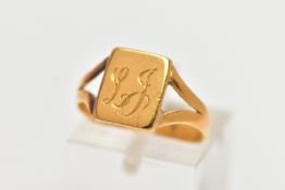 A YELLOW METAL SIGNET RING, rectangular form signet, engraved 'LJ', leading onto bifurcated