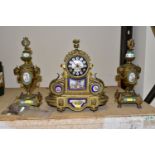A FRENCH STYLE GILT METAL CHIMING MANTLE CLOCK, hand painted porcelain dial and inset plaques,