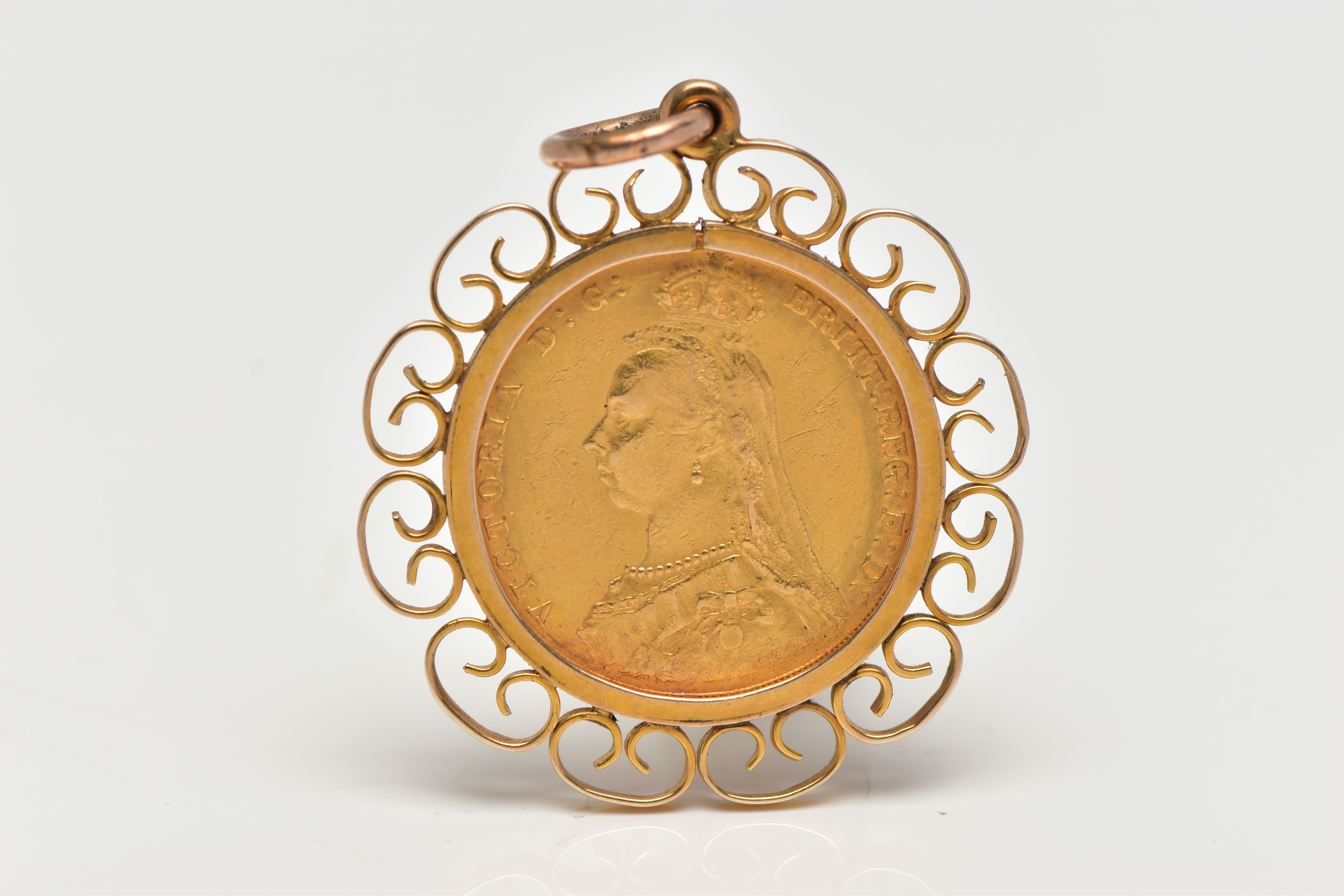 A FULL SOVEREIGN COIN PENDANT, the coin dated 1887, within an openwork scroll surround, pendant - Image 2 of 2