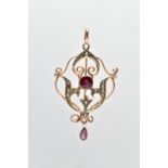 AN EDWARDIAN GEM SET PENDANT, openwork pendant set with a circular cut ruby and a pear cut