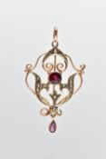 AN EDWARDIAN GEM SET PENDANT, openwork pendant set with a circular cut ruby and a pear cut