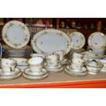 A PORCELAIN DINNER SET, makers mark on base NS, possibly continental, comprising one covered tureen,