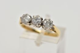 AN 18CT GOLD THREE STONE DIAMOND RING, set with three round brilliant cut diamonds, each in a six