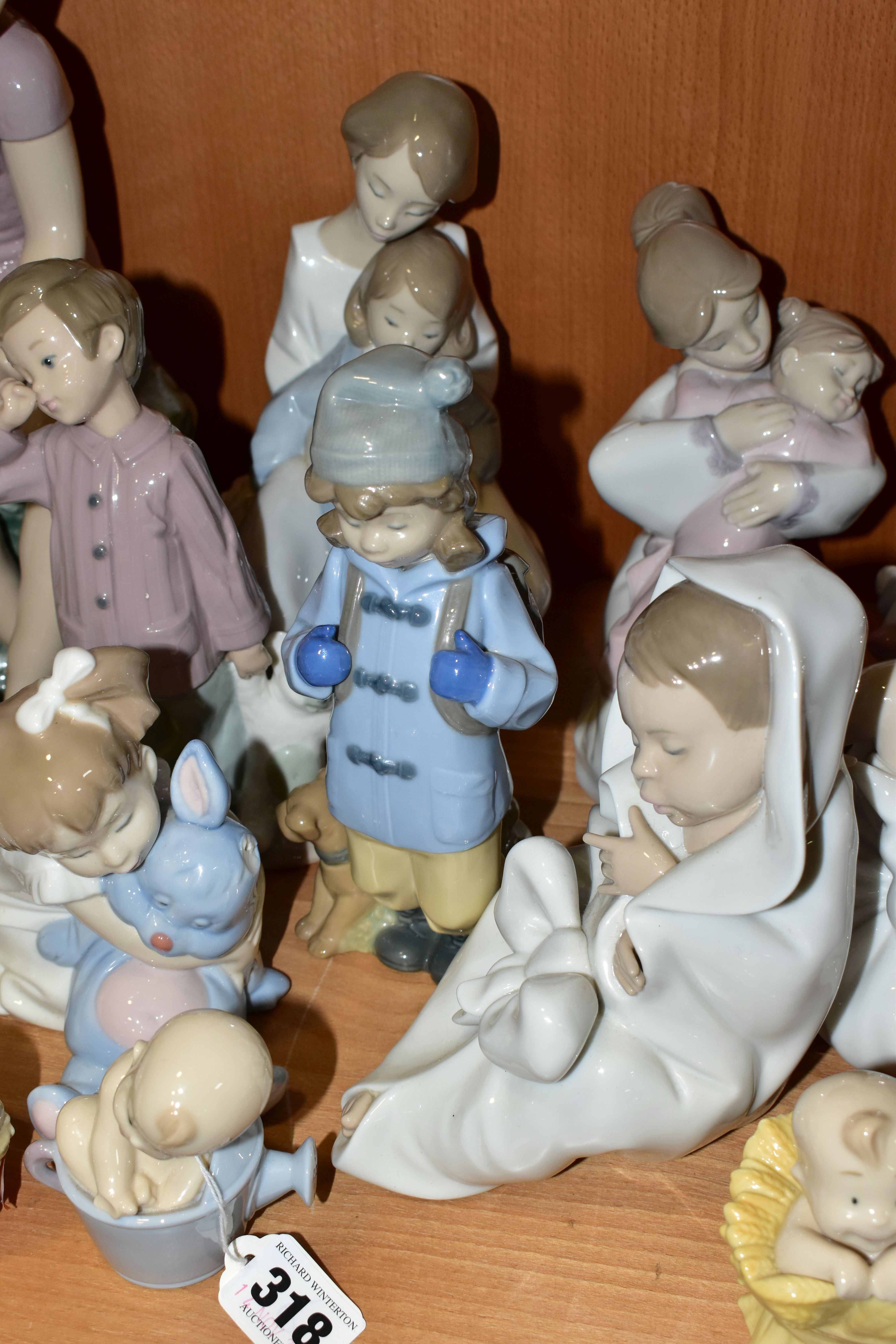 SIXTEEN LLADRO NAO FIGURINES, comprising four figures from the Where Do Babies Come From - Image 5 of 7