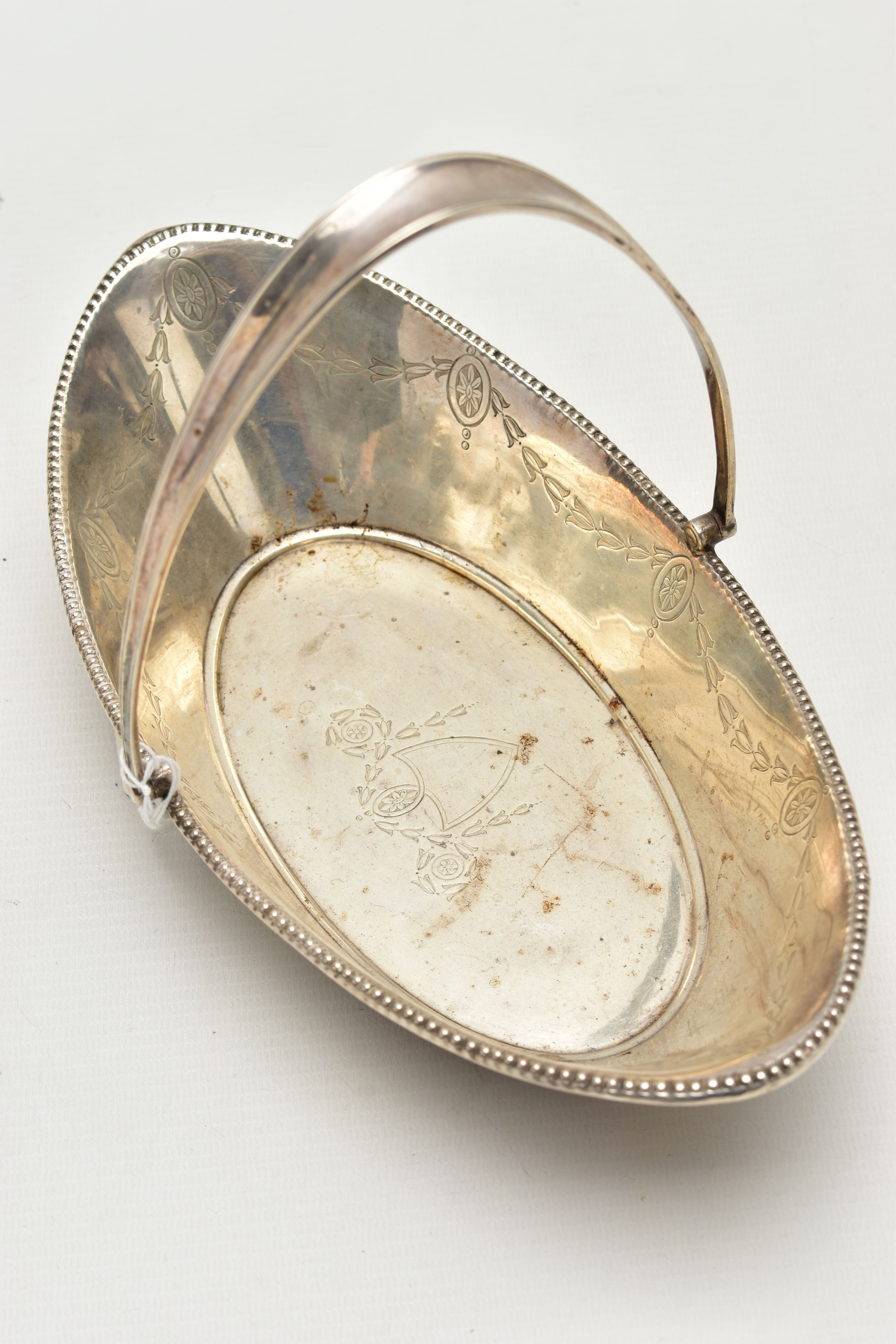 A SILVER BASKET, a boat shaped dish, engraved with floral detail, fitted with a tapered handle, - Image 7 of 8