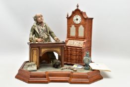 A CAPODIMONTE PORCELAIN TABLEAU 'THE CLOCK MAKER', sculpted by Mario Angela, modelled as a gentelamn