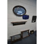 AN OAK FRAMED GYPSY WALL MIRROR, an oval wall mirror, four various other mirrors, wall hooks/