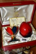 A BOXED ROYAL DOULTON FLAMBÉ EGG AND STAND, limited to a worldwide edition of 3500, this piece is