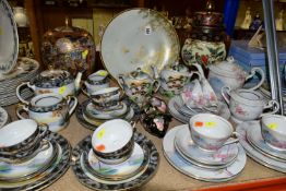 A QUANTITY OF ORIENTAL CERAMICS, comprising a footed charger decorated with a scene a of a cherry