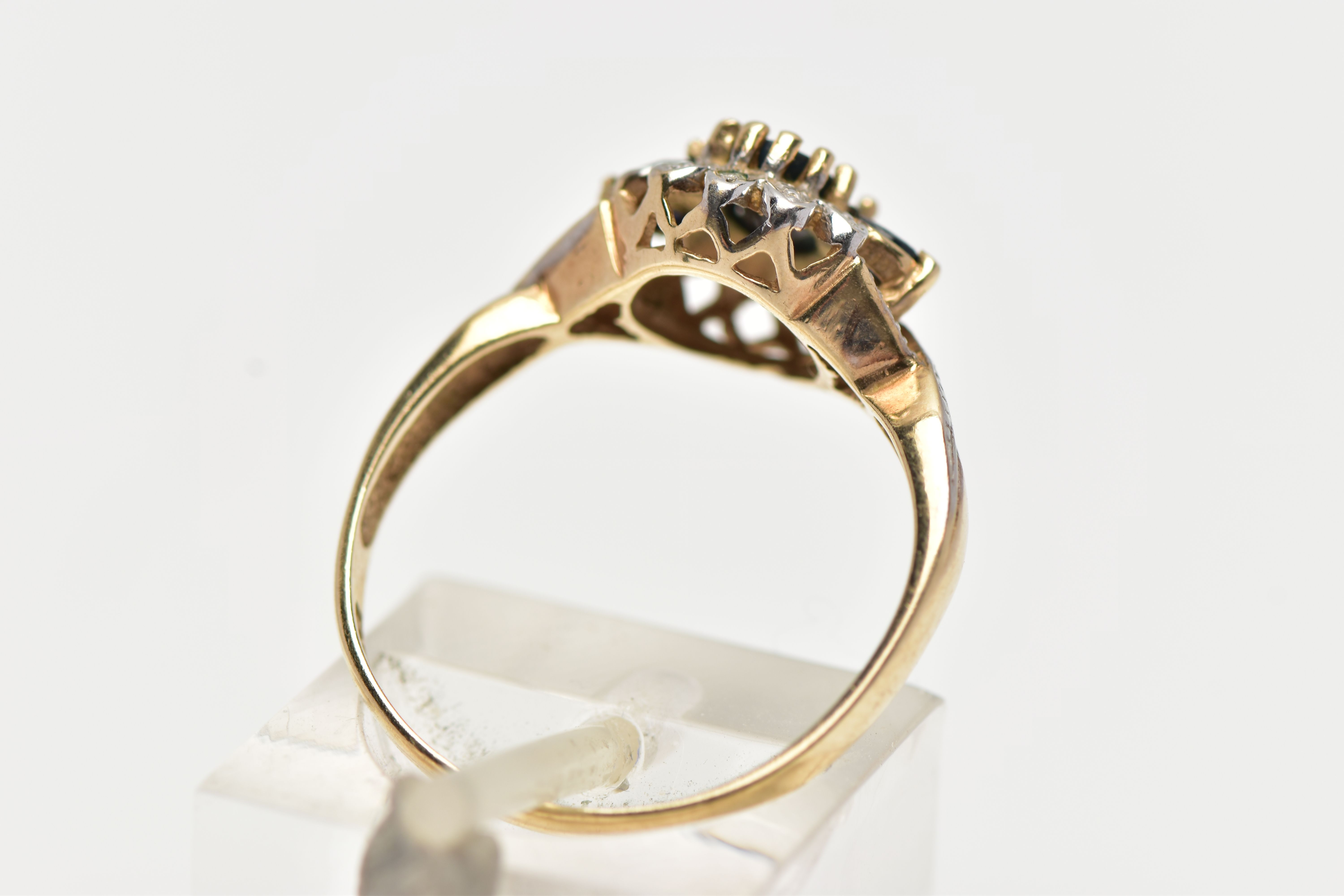 A 9CT GOLD CLUSTER RING, of a circular form, set with an oval and two circular cut blue sapphires, - Image 3 of 4