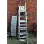 THREE SETS OF ALUMINIUM LADDERS the longest being 240cm long, a platform, a spade, a shovel and a