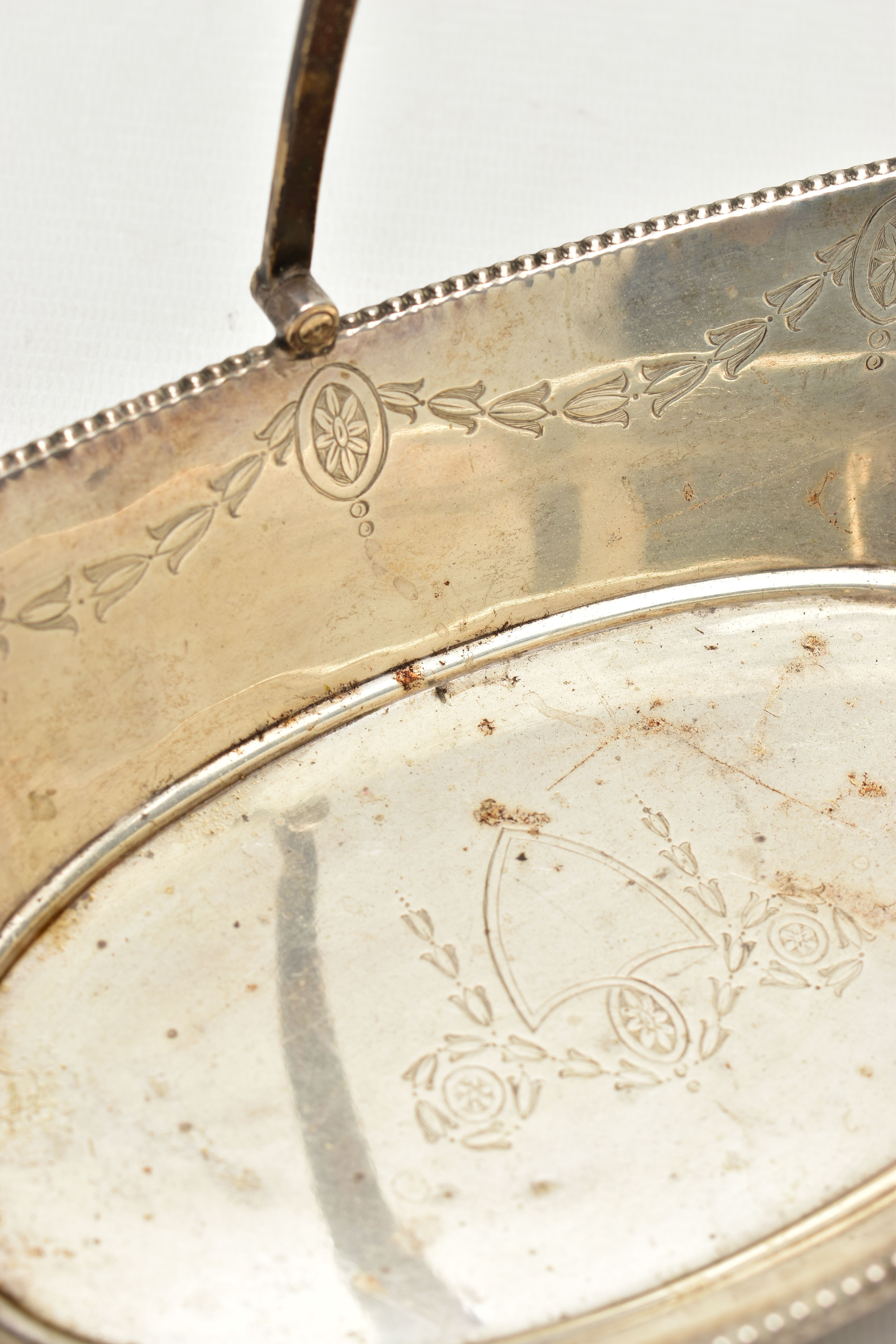 A SILVER BASKET, a boat shaped dish, engraved with floral detail, fitted with a tapered handle, - Image 8 of 8