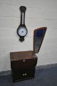 AN OAK DROP LEAF TEA TROLLEY, an oak aneroid barometer, and a mid-century wall mirror (3)