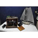 A VINTAGE SINGER 99K SEWING MACHINE in wooden case with some accessories (UNTESTED) along with a