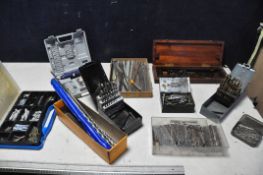 A LARGE COLLECTION OF DRILL BITS along with a small tray of saw blades, cased combination square (