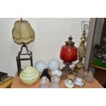 TWO VINTAGE TABLE LAMPS AND A GROUP OF ASSORTED GLASS SHADES, comprising a large green onyx and gilt