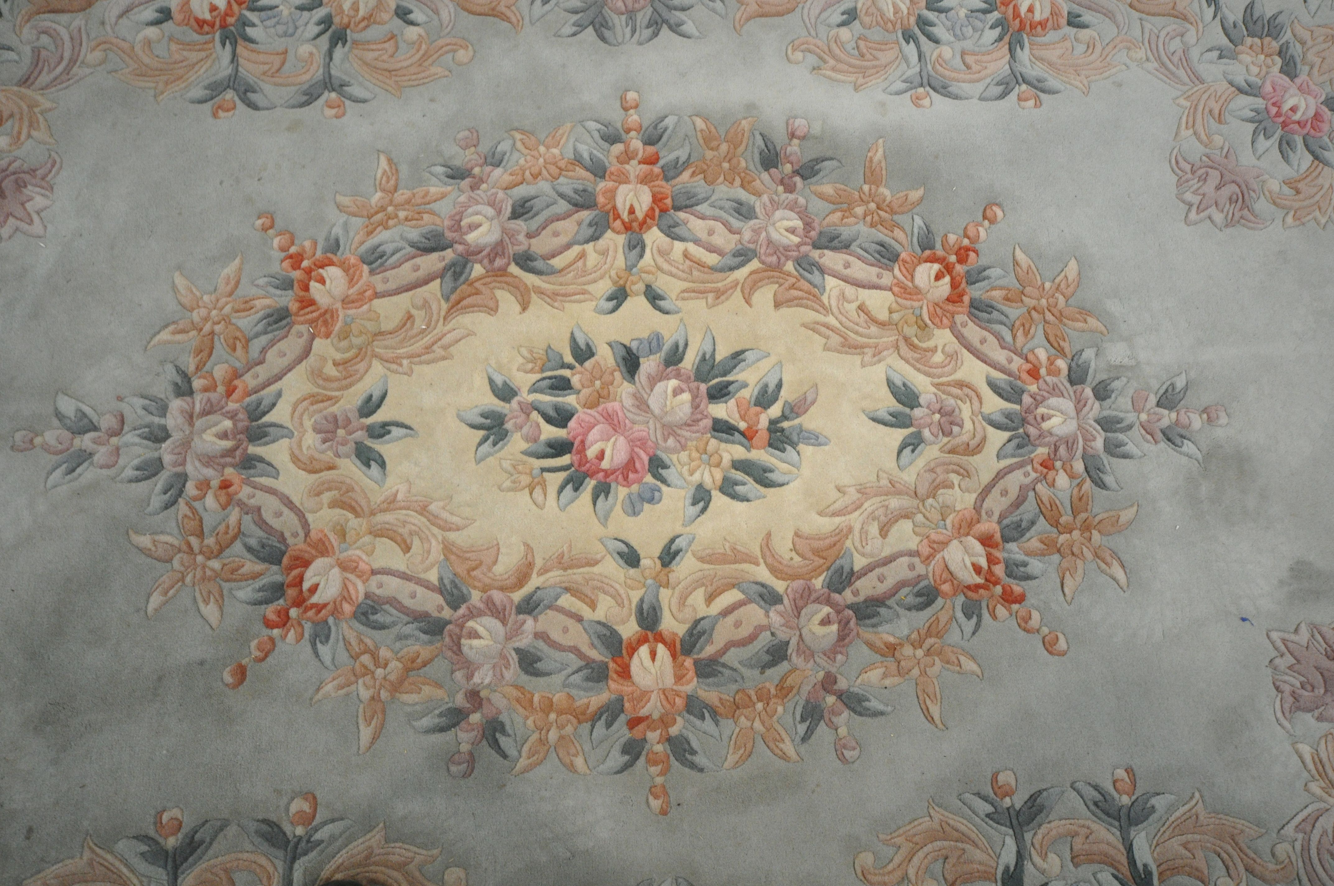 A TEAL CHINESE WOOLEN RUG, with floral border and central design, 284cm x 186cm (condition - in need - Image 3 of 3