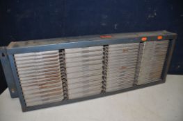 A VINTAGE ENOX WALL HANGING ORGANIZER comprising of fifty swinging trays of graduated sizes