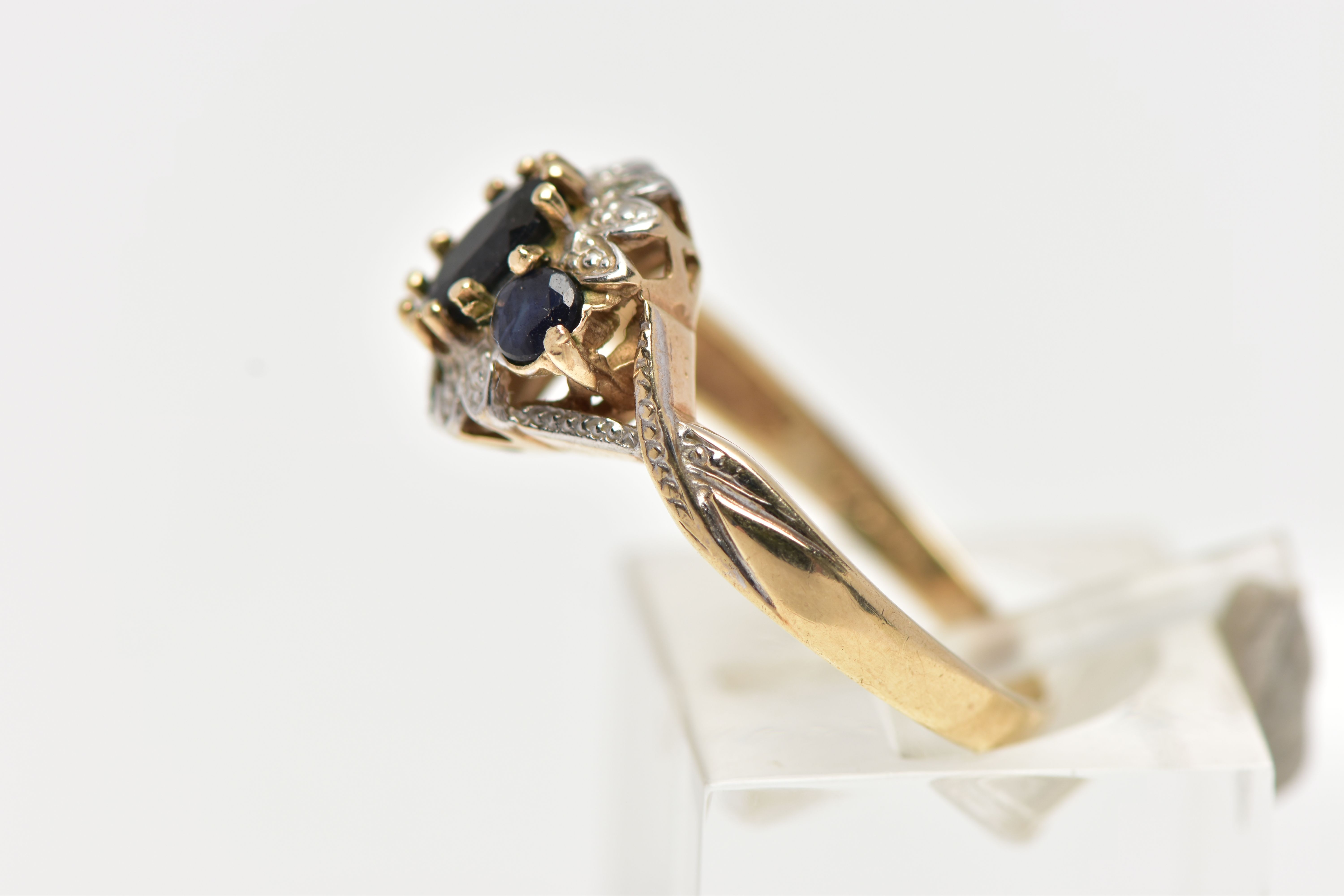 A 9CT GOLD CLUSTER RING, of a circular form, set with an oval and two circular cut blue sapphires, - Image 2 of 4