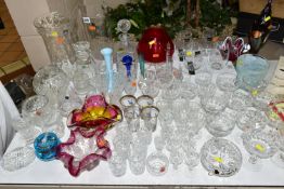 A COLLECTION OF CUT CRYSTAL AND COLOURED ART GLASS, comprising a Murano clear to cranberry