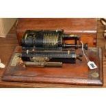 A GUYS BRITANNIC CALCULATING MACHINE, with wooden cover