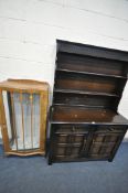 A 20TH CENTURY OAK DRESSER, plate rack above two drawers and two doors, and a walnut single door