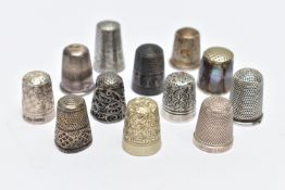 TWELVE THIMBLES, to include six with silver hallmarks, approximate gross weight 27.0 grams, six