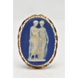 A WEDGWOOD BROOCH, of an oval form, blue and white portrait of two ladies, collet set into a