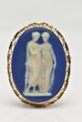 A WEDGWOOD BROOCH, of an oval form, blue and white portrait of two ladies, collet set into a