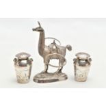 WHITE METAL NOVELTY PEPPPERETTES WITH STAND, the stand in the form of a lama carrying two pots for