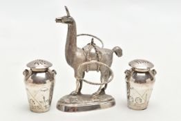 WHITE METAL NOVELTY PEPPPERETTES WITH STAND, the stand in the form of a lama carrying two pots for