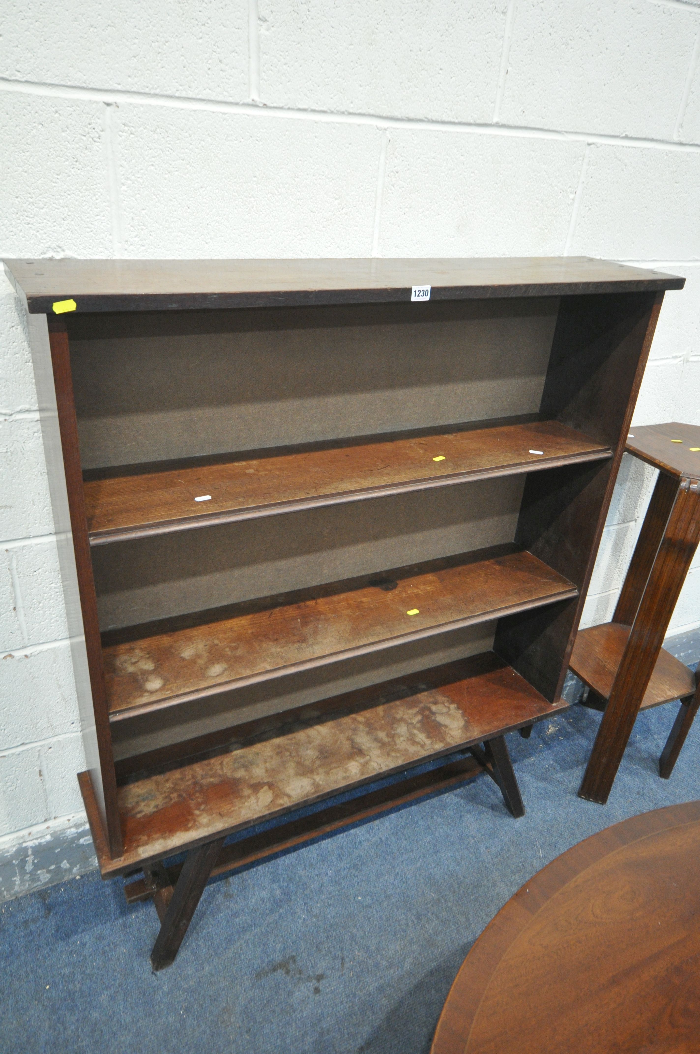 A MAHOGANY OPEN BOOKCASE, with two fixes shelves, on a trestle base, width 110cm x depth 26cm x - Image 2 of 4