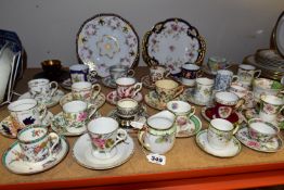 TWENTY SIX ASSORTED COFFEE CUPS AND SAUCERS, comprising a Coalport bread and butter plate hand