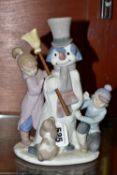 A LLADRO FIGURE GROUP, 'The Snowman' No 5713 by Francisco Catala, introduced in 1990, height 21cm (