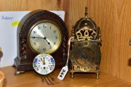 THREE CLOCKS, comprising a Smiths brass cased lantern clock with Roman numerals, dial stamped '