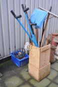 A WOODEN TUB AND A PLASTIC TRAY CONTAINING GARDEN TOOLS AND ORNAMENTS including two hanging basket