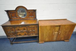 A 20TH CENTURY OAK SIDEBOARD, with a raised mirror back, with two drawers, flanked by two cupboard