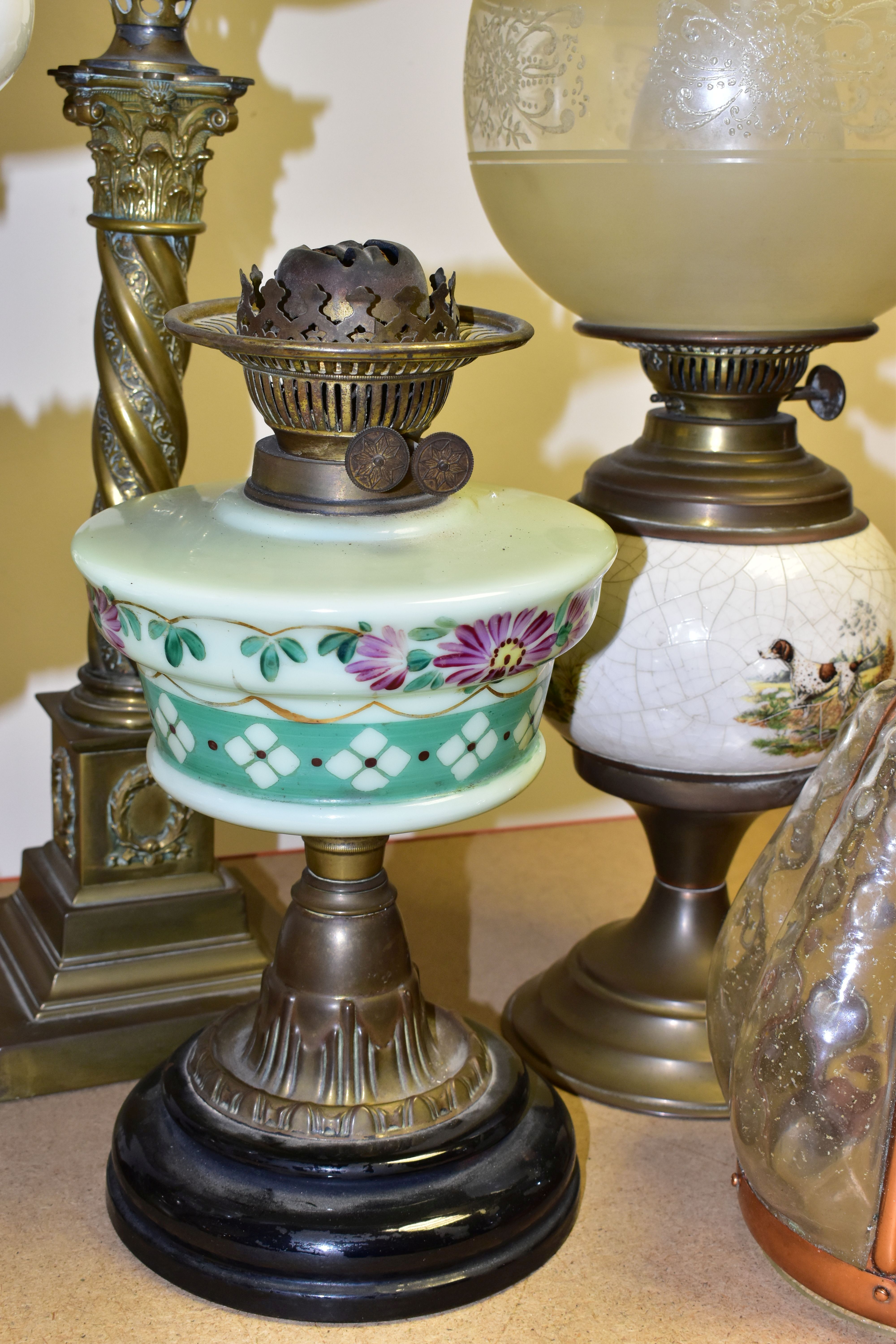 FOUR VICTORIAN OIL LAMPS, comprising an Eltex oil lamp with a brass base and fittings a white - Image 7 of 11