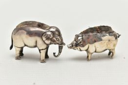 TWO EDWARDIAN SILVER PIN CUSHIONS, the first a small silver pig, approximate dimensions height