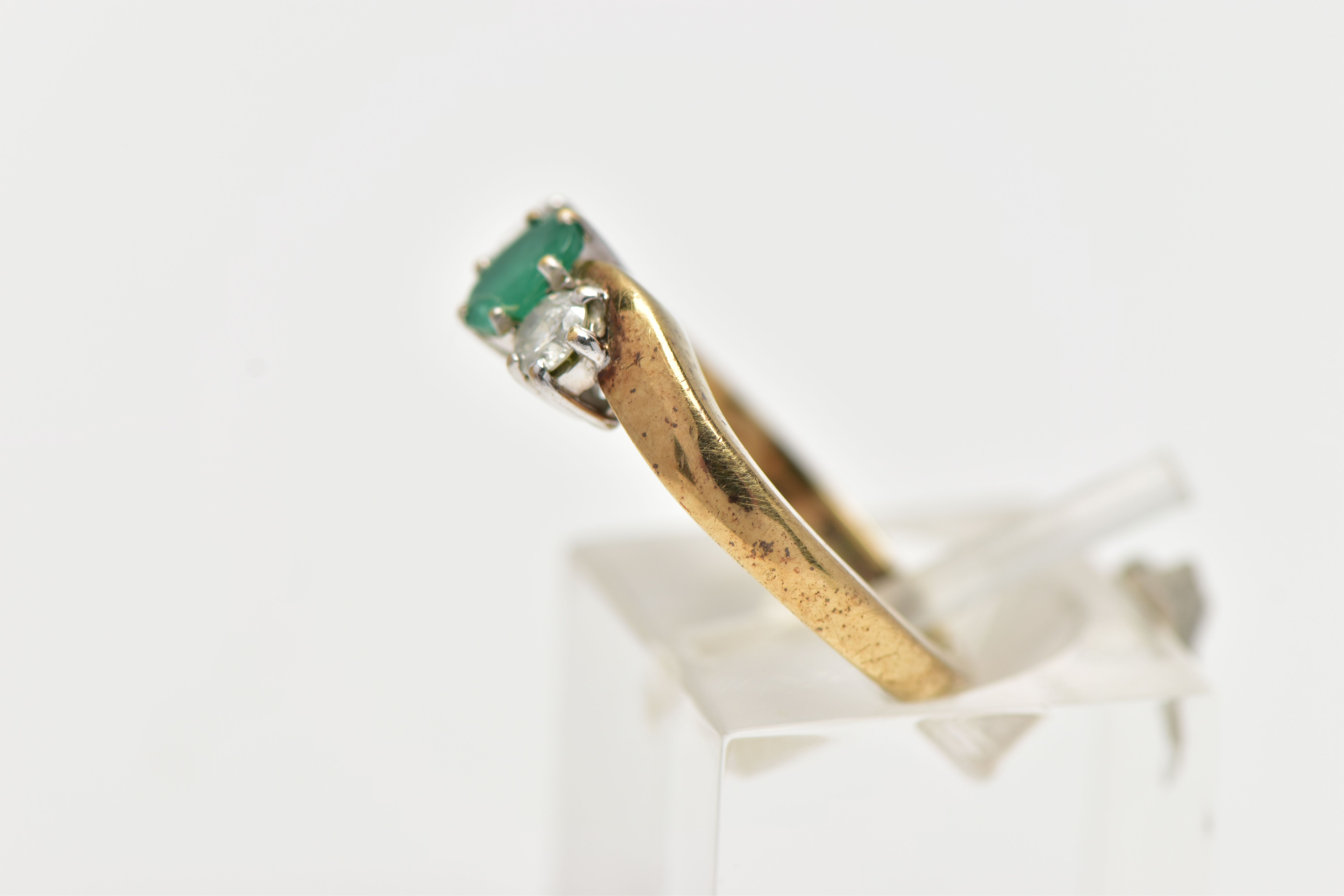 A 9CT GOLD EMERALD AND DIAMOND RING, centrally set with an oval cut emerald in a six claw setting, - Image 2 of 4