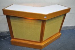 A MID CENTURY TURNIDGE OF LONDON TEAK ANGLED DRINKS BAR, with a synthetic woven panel front, white