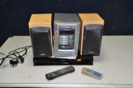 AN AIWA XR-M191 MINI HI FI with remote and a Panasonic DMT-EX773 DVD player with remote (both PAT