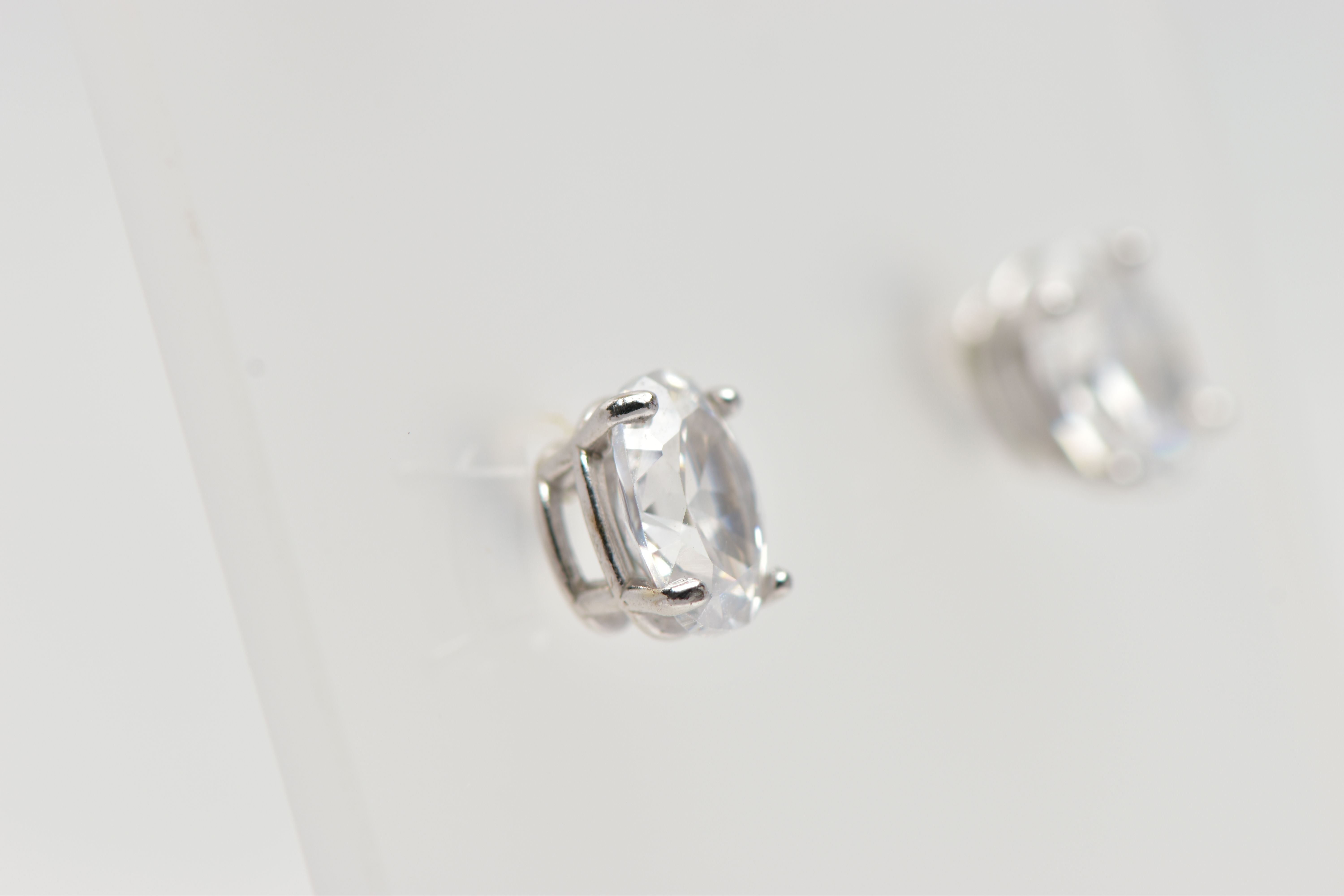 THREE PAIRS OF GEM SET EARRINGS, the first a pair of cluster stud earrings, set with an oval cut - Image 4 of 4