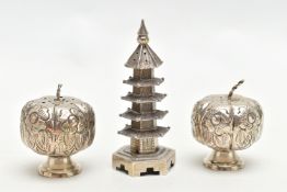 THREE NOVELTY WHITE METAL PEPPERETTES, to include a pair of pumpkin style pepperettes, with floral