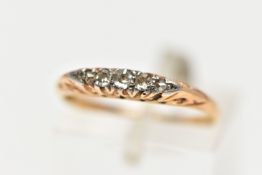 AN EARLY 20TH CENTURY YELLOW METAL, FIVE STONE DIAMOND RING, set with three single cut diamonds