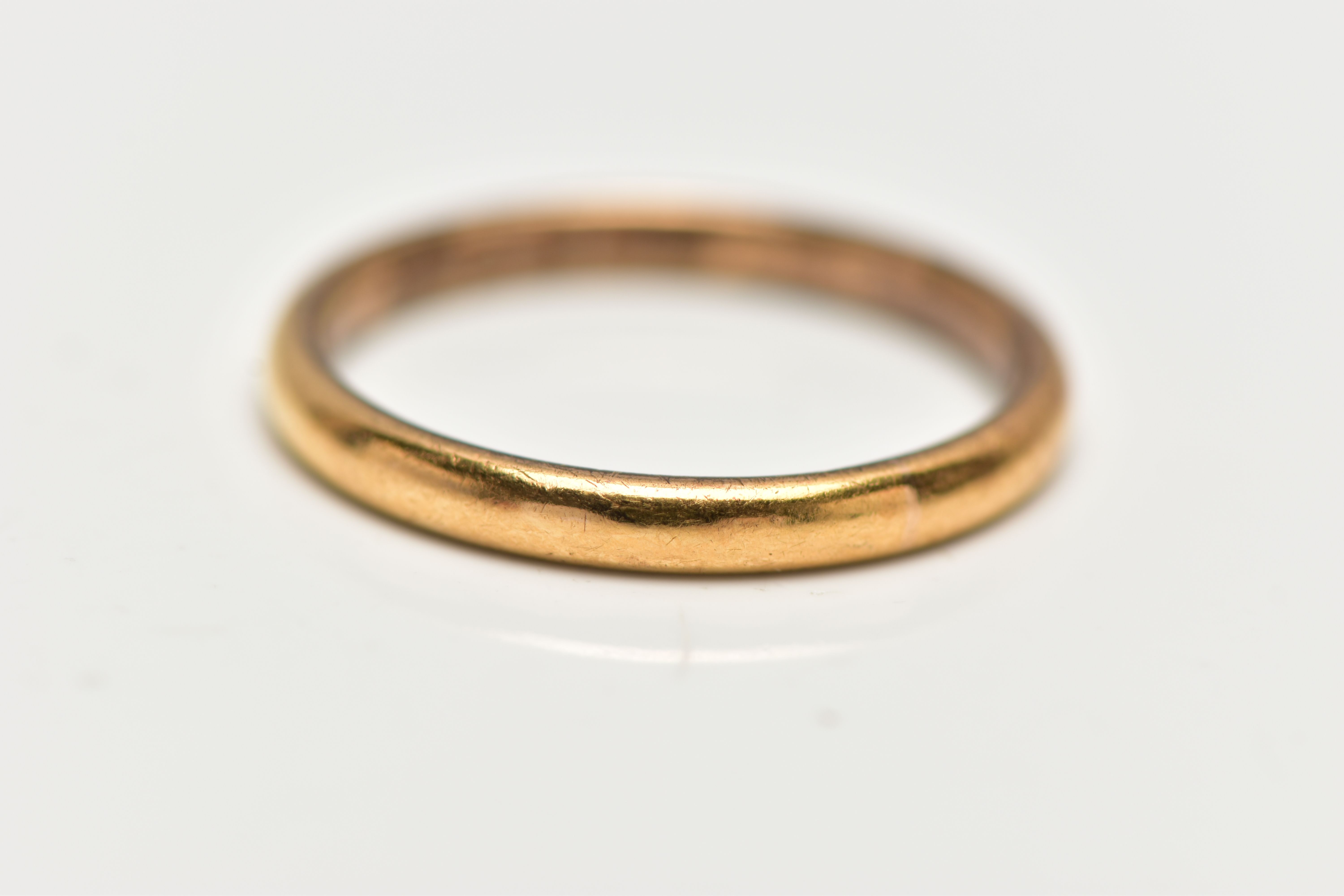 A THIN 22CT GOLD BAND RING, plain polished thin band, approximate width 2.2mm, ring size J, - Image 2 of 2