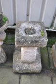 A MODERN COMPOSITE BIRD BATH with square section foot, base and bowl 62cm high