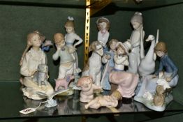 FOURTEEN NAO FIGURINES AND ANIMAL FIGURES, to include a seated girl with rabbits, a yawning dog, a